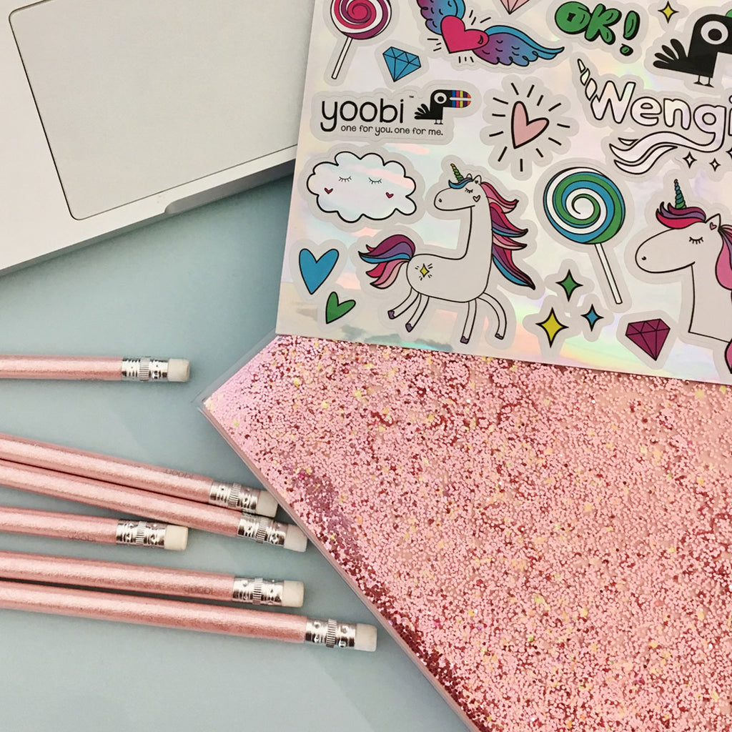 Take a look at Wengie's absolutely essential back to school supplies. This exclusive Wengie x Yoobi collaboration brings you a limited edition box filled with magical goodies. From a glitter journal, unicorn pen and pencil case to washi tape and a custom designed sticker sheet. 