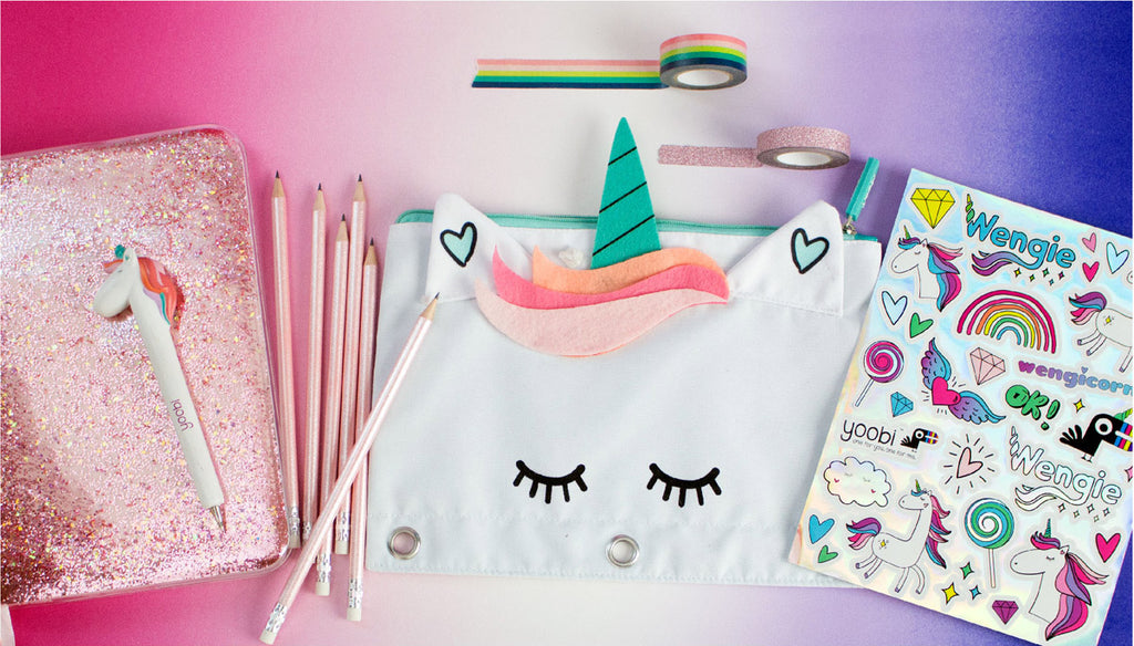 Take a look at Wengie's absolutely essential back to school supplies. This exclusive Wengie x Yoobi collaboration brings you a limited edition box filled with magical goodies. From a glitter journal, unicorn pen and pencil case to washi tape and a custom designed sticker sheet. 