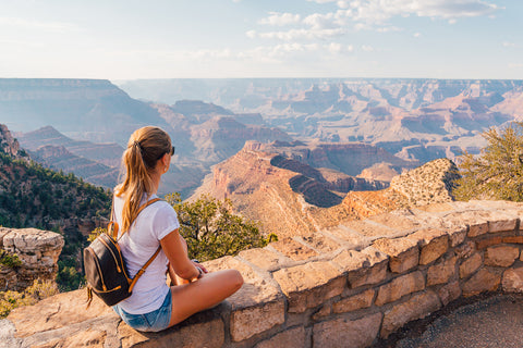 Beautiful girl exploring Grand Canyon National Park in Arizona, USA