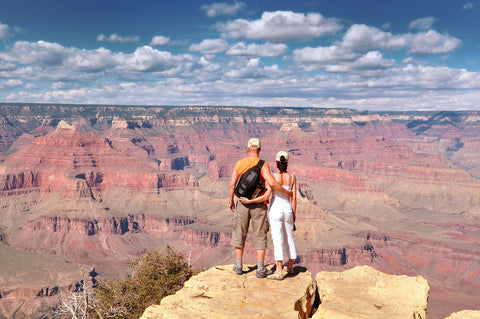 Couple hugging and overlooking Grand Canyon National Park