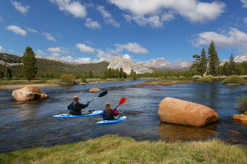 Couple kayaking in river of Yosemite National Park