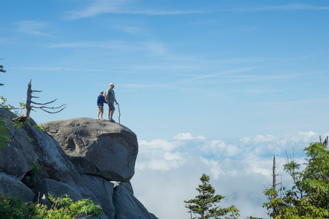 People hiking above the clouds in Great Smoky Mountains National Park