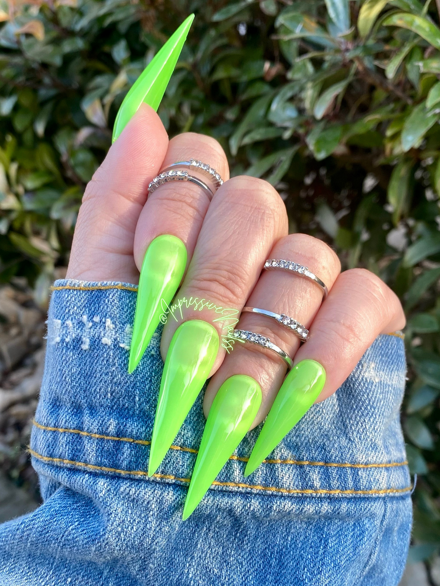 neon green stiletto nails