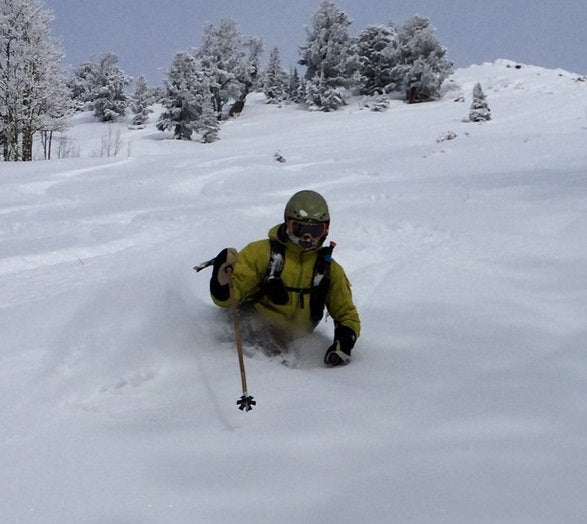 Micah deep powder skiing