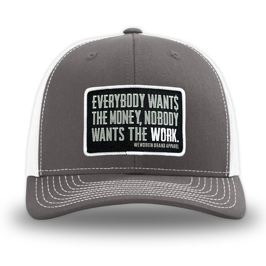 Charcoal/White WeWorkin hat—Richardson 112 brand snapback, retro trucker classic hat style. WeWorkin "Everybody Want$ the Money, Nobody Wants the WORK." patch is centered on the front panels.