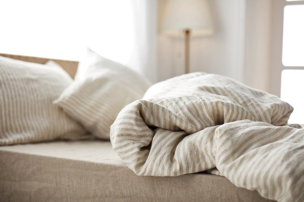 Clean and pressed blankets on a guest bed