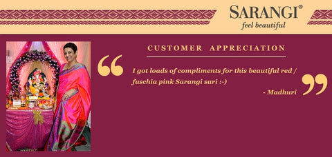 A happy Sarangi Customer in a Red/Pink Sarangi Sari