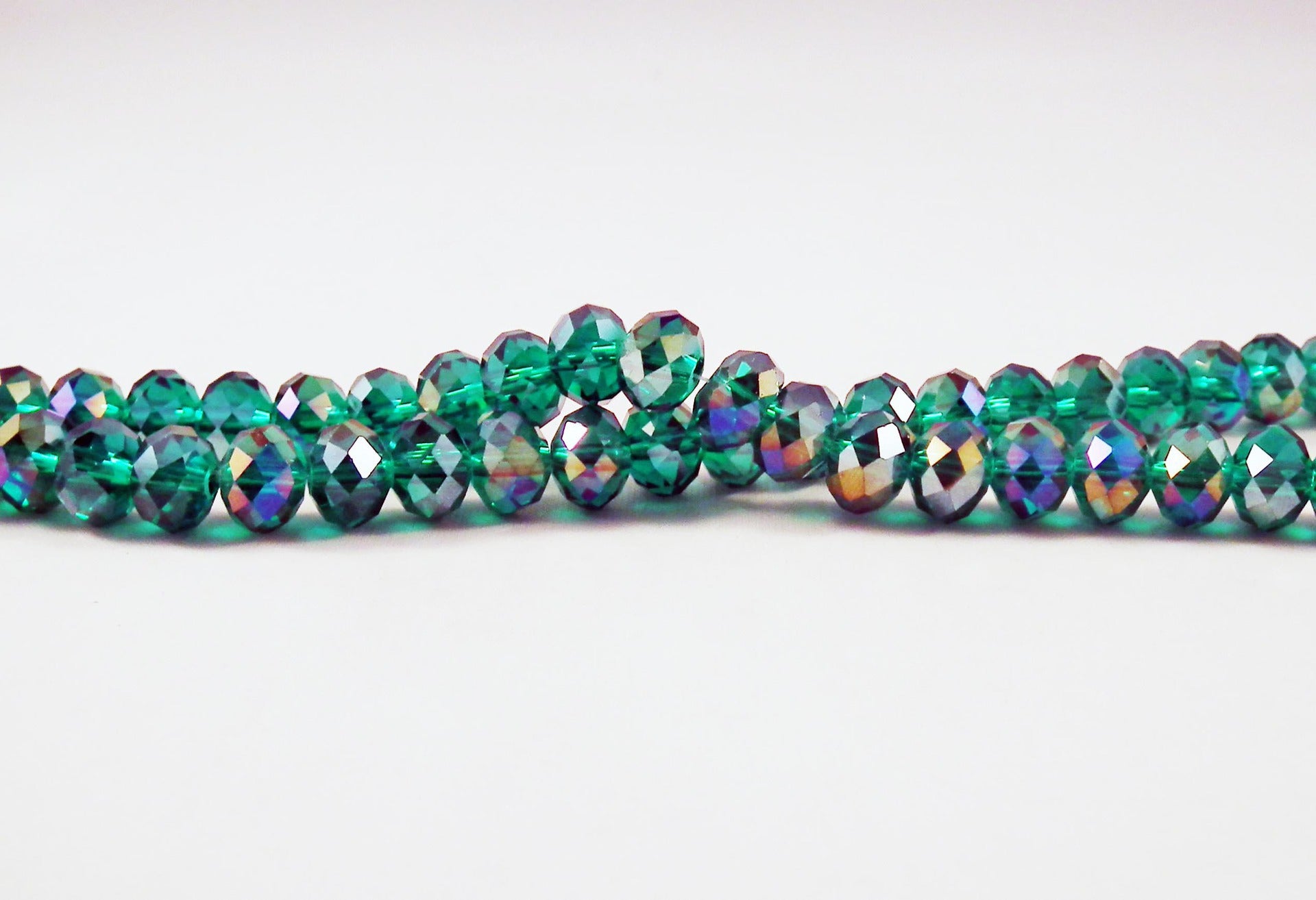PSW03 - 10 Perles Précieuses Bleu-Vert émeraude 8X6mm en Verre Cristal de couleur Vert émeraude, Rondelles à Facettes, 8mm X 6mm.