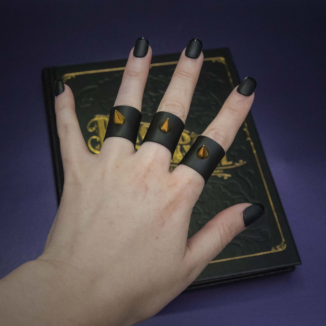 STAR DUSTERS Rings Matt Black With Gold Spikes