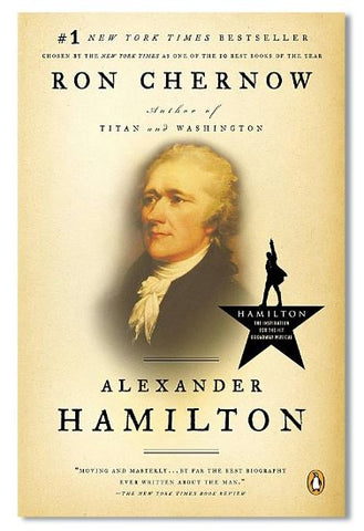 Photo of antique yellow book cover with portrait of man and logo of Hamilton musical