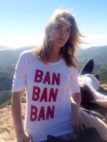 prinkshop founder pamela bell wearing t-shirt in support of gun legislation 
