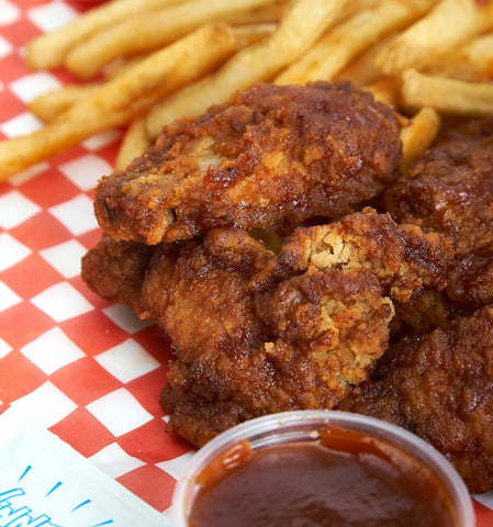 Image of chicken wings and fries