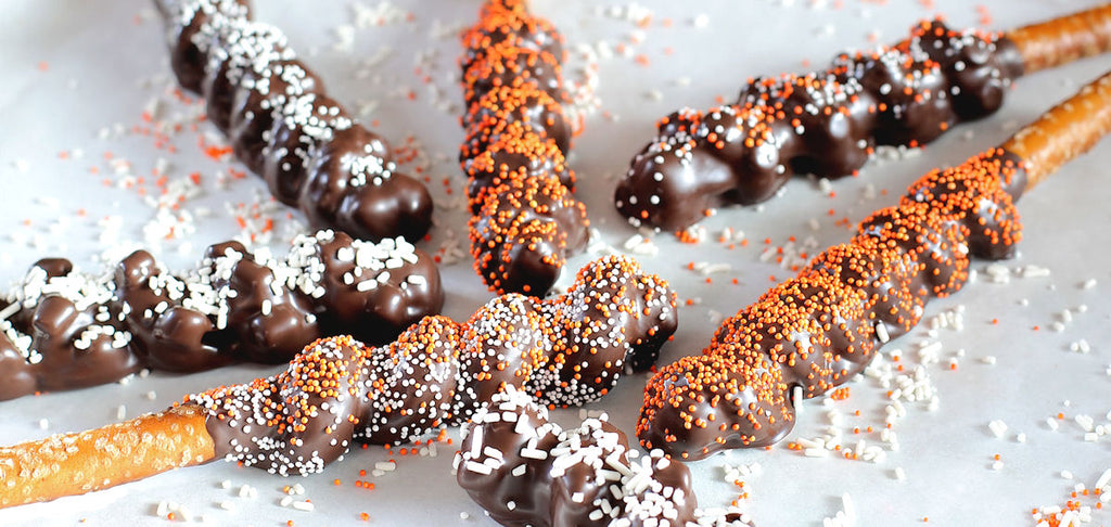 loaded caramel chocolate pretzels with sprinkles