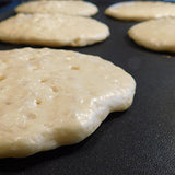Ladle the batter onto a non stick pan or griddle and watch the pancakes bubble up!