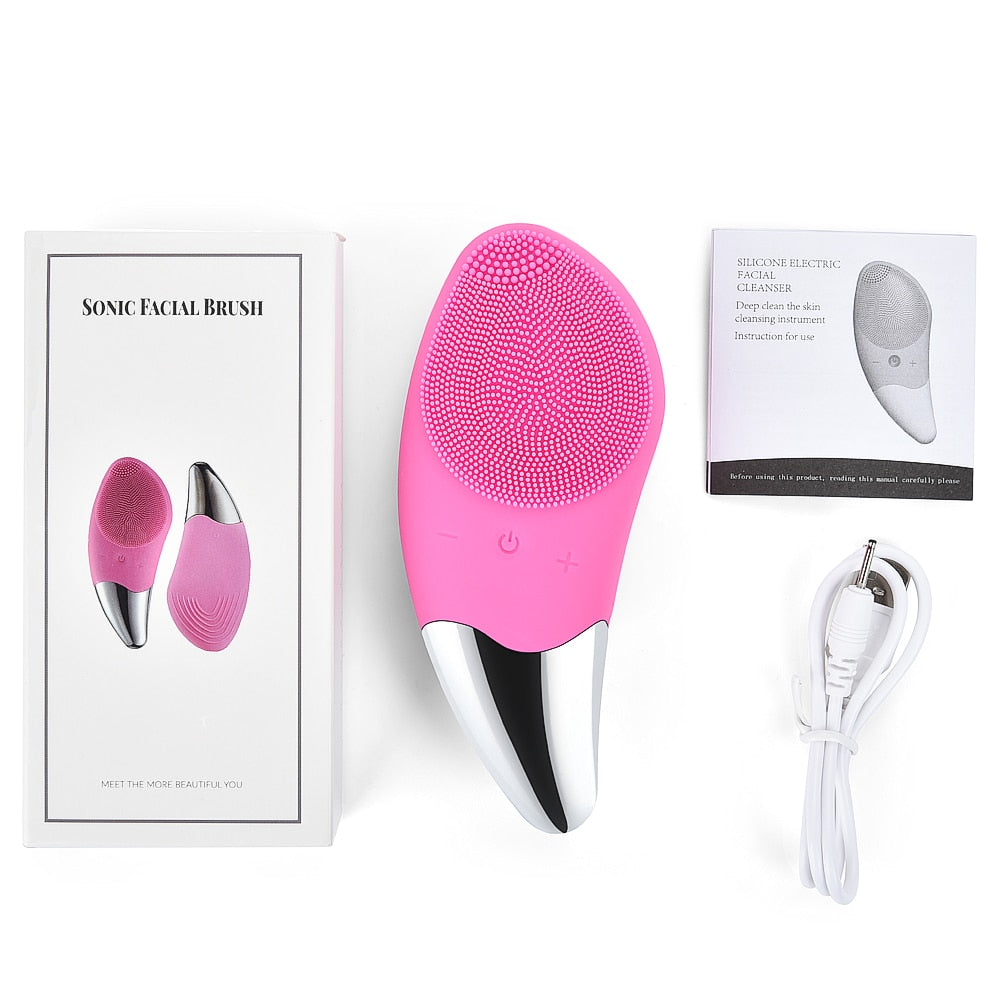 Pink facial cleansing brush with box, manual and USB charging cable