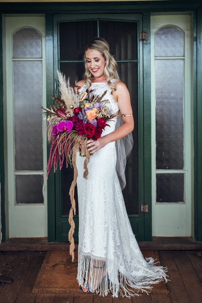 Stunning and unique wedding gown by Grace Loves Lace with Botanicals by Lara Rose