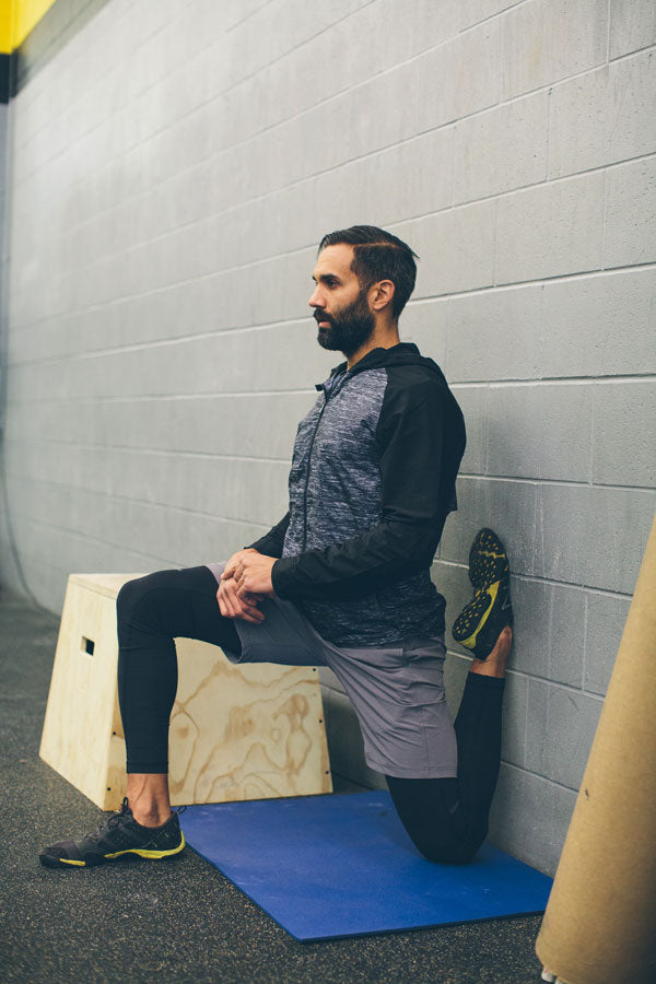 Myles Men Tom Hamdani of CrossFit Alinea Stretches