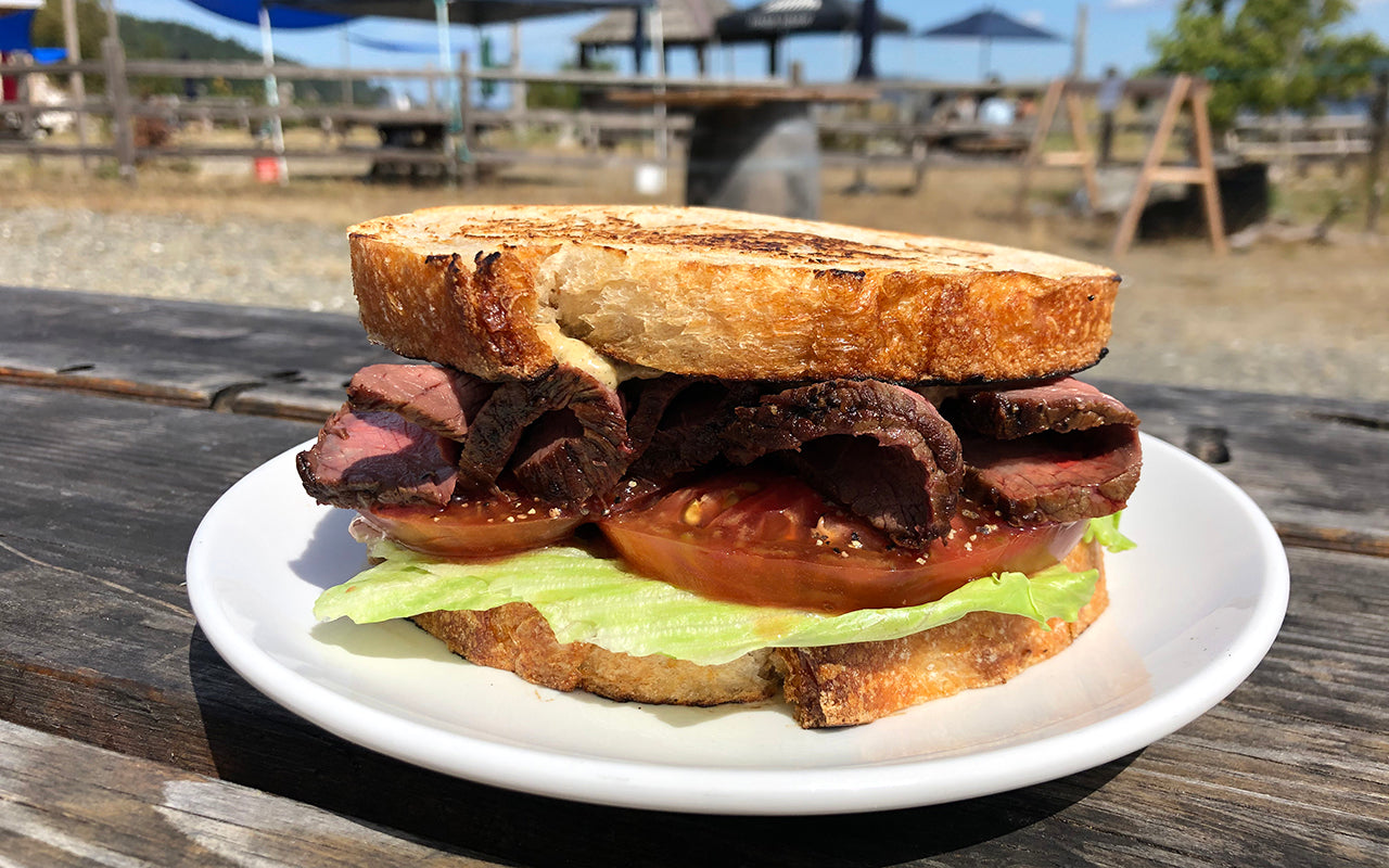 Oyster Rancher's Sandwich has roast beef, lettuce, tomato and a smoked oyster mayo