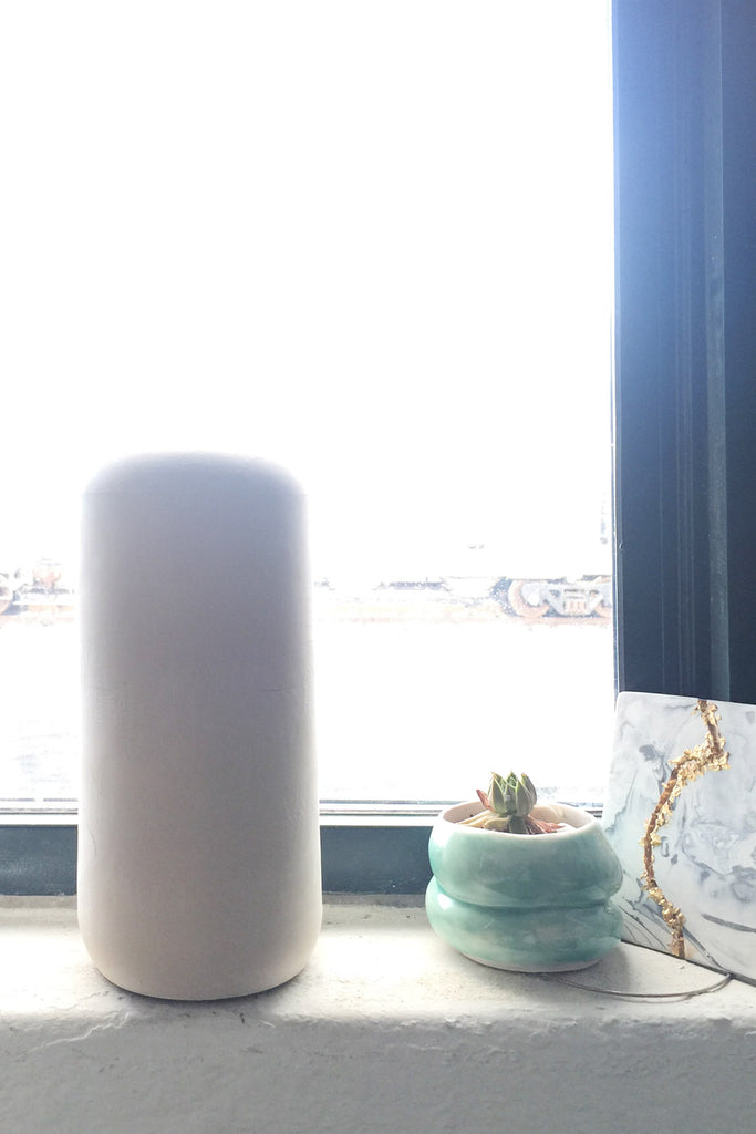 tall white porcelain vase made in Boston