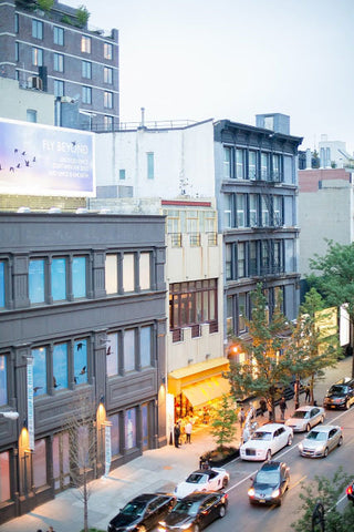 Street view of the super cool SOHO party location as the sun sets on New York City.