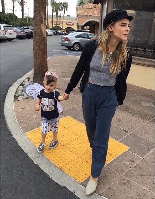 Samaire Armstrong wearing LOU.EARL shoes crossing the street with her son
