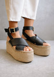 [Color: Black] Alohas elegant willow espadrille sandals with black criss crossed leather straps and a jute platform.