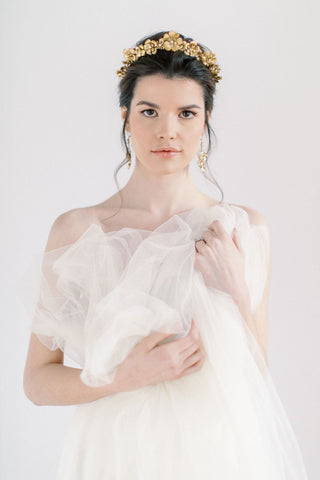 Bride wearing bridal jewelry and hair crown