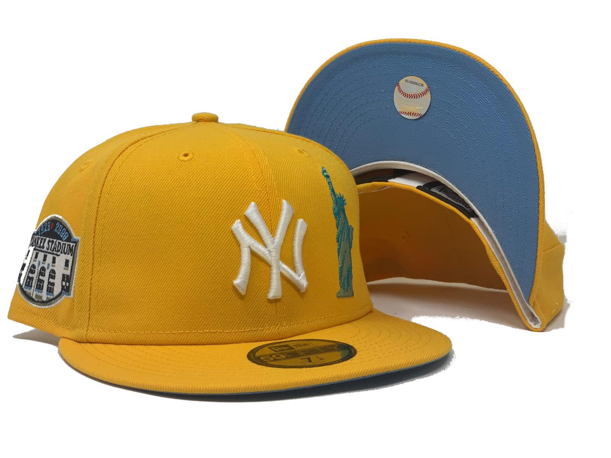 blue and yellow yankees hat