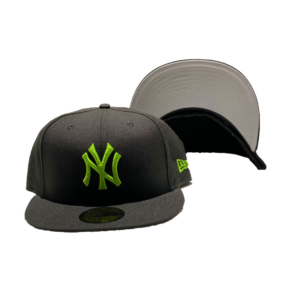 black and lime green yankees hat