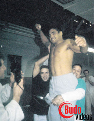 Rickson Gracie being hoisted after his victory