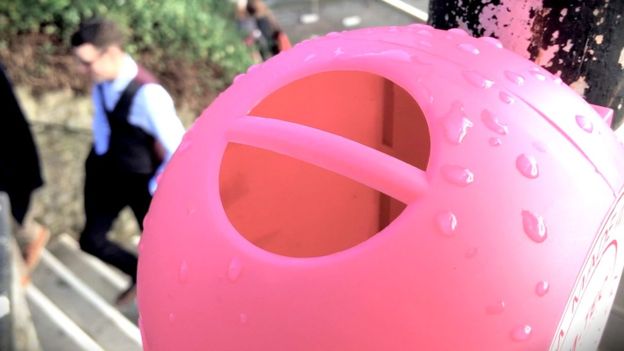 Pink colored storage bin made from recycled bubble gum