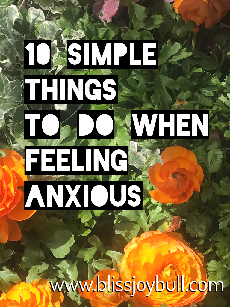 orange and pink flowers with green leaves; text overlay reads: 10 Simple Things To Do When Feeling Anxious www.blissjoybull.com