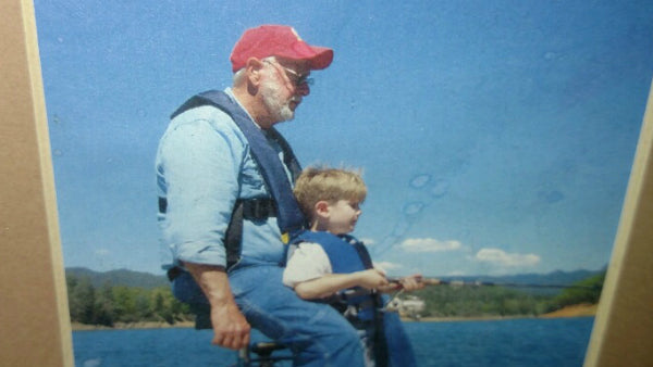 Tanyalynn Cornett's father and son on Merle Haggard's fishing boat. (Photo courtesy: Tanyalynn Cornett)