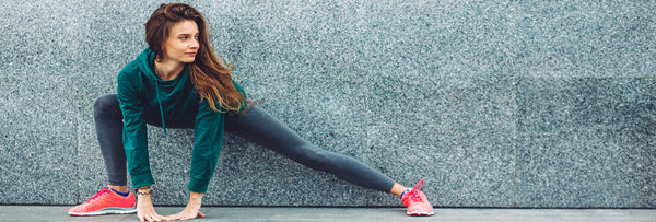 woman-stretching-workout-wear