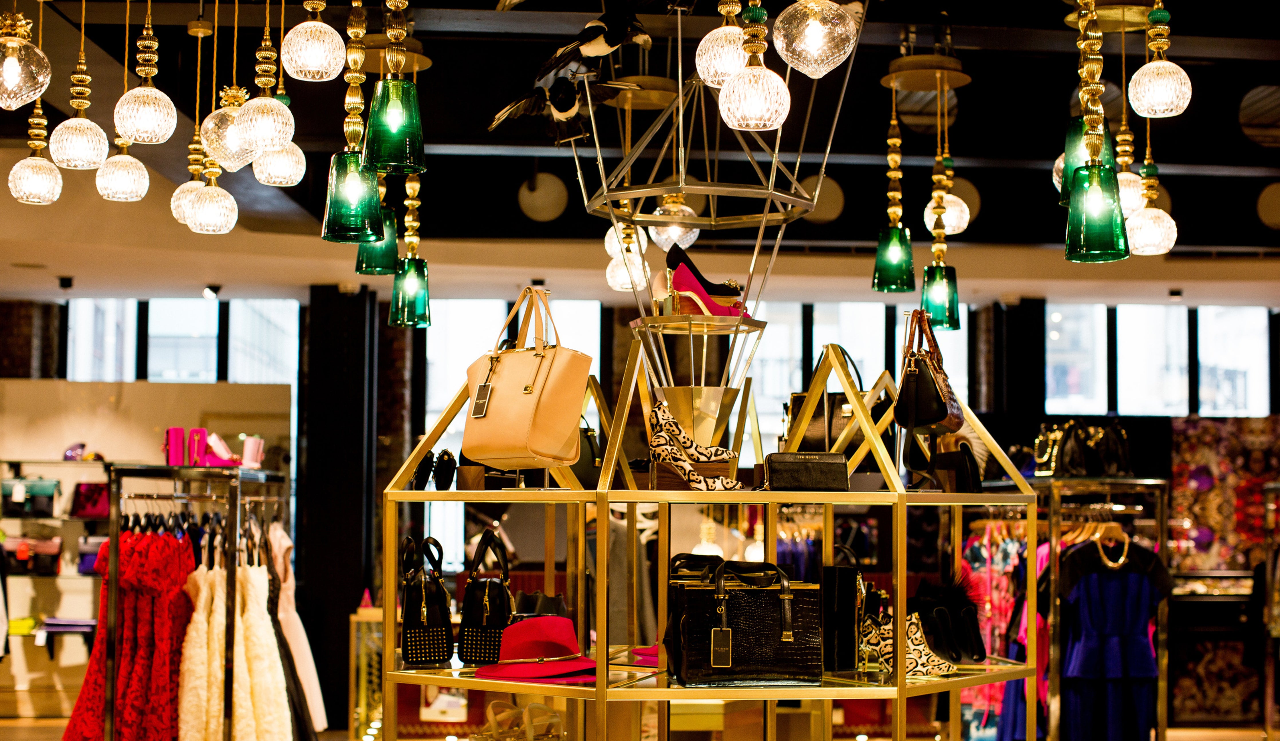 Bespoke pendant lighting by Rothschild &amp; Bickers at Ted Baker Regent Street store London.