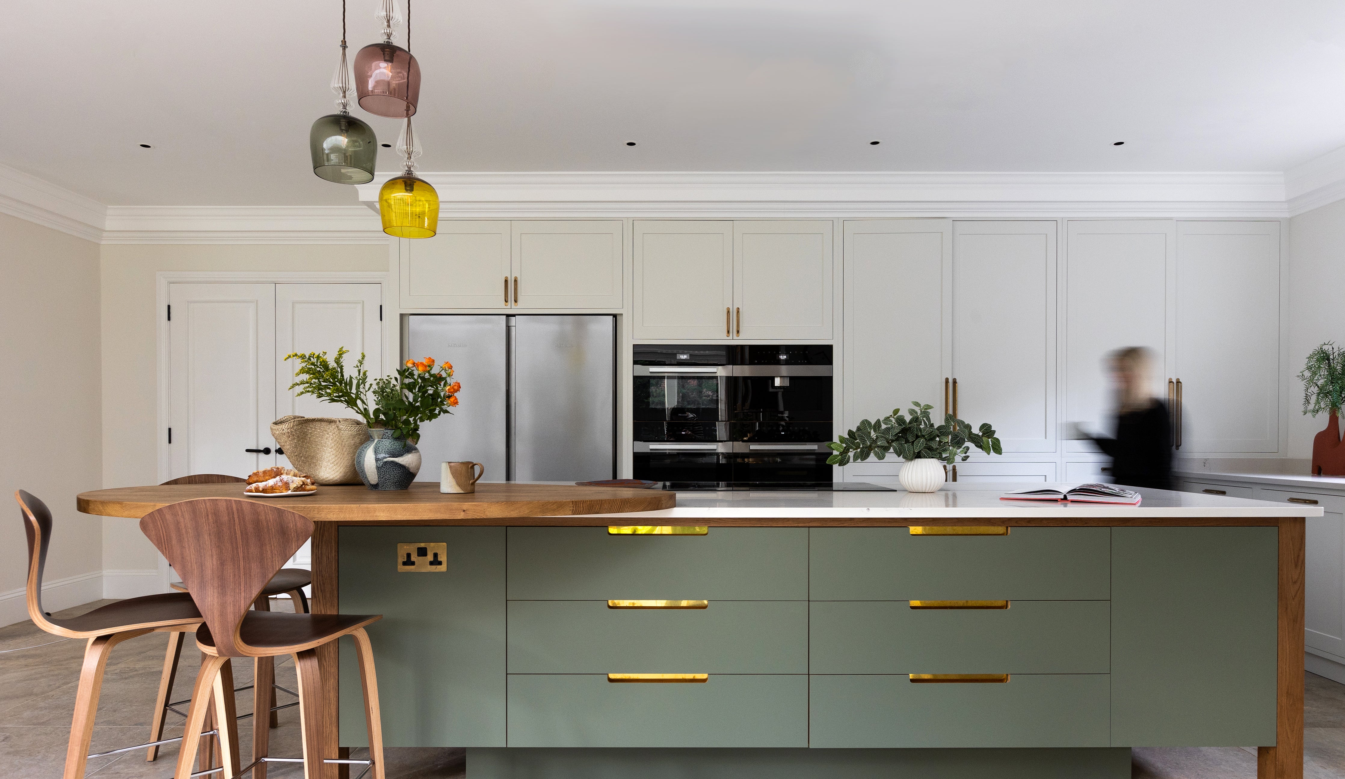 Rothschild &amp; Bickers mouth blown glass pendant lighting over kitchen island by Pfeiffer Design