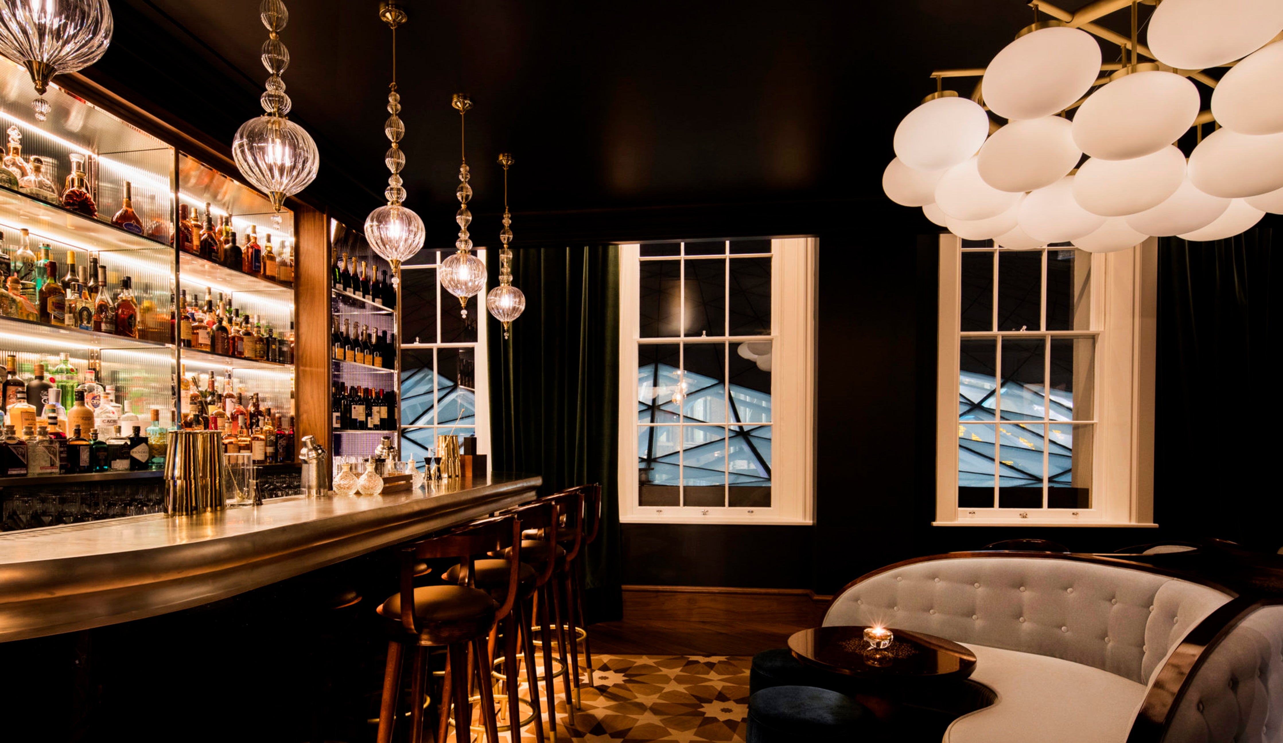 Bespoke glass pendants by Rothschild &amp; Bickers at the Anthracite Martini Bar in Kings Cross Great Northern Hotel