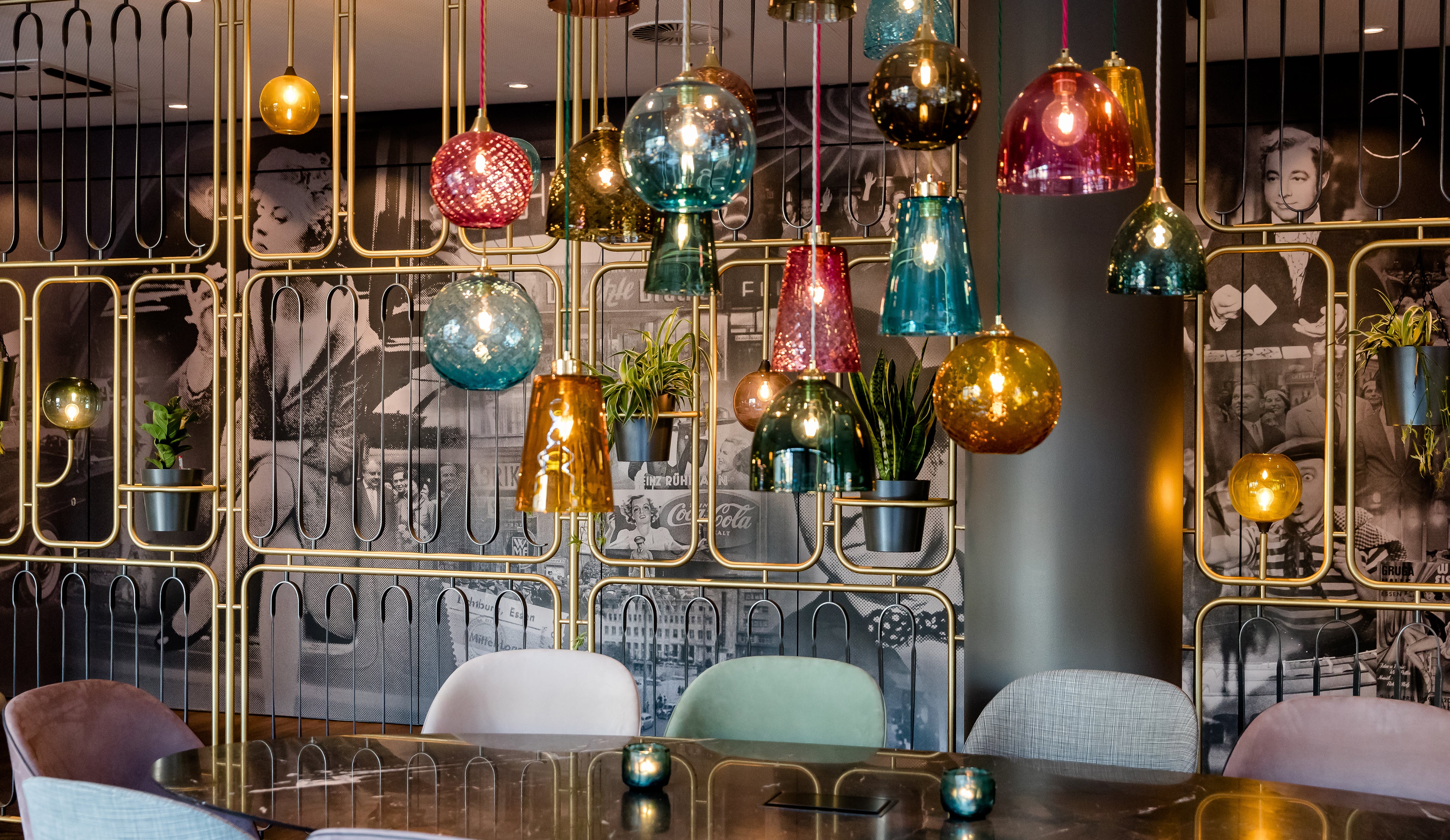 Pick-n-Mix glass pendant lights by Rothschild &amp; Bickers hanging in Motel One Essen Lobby