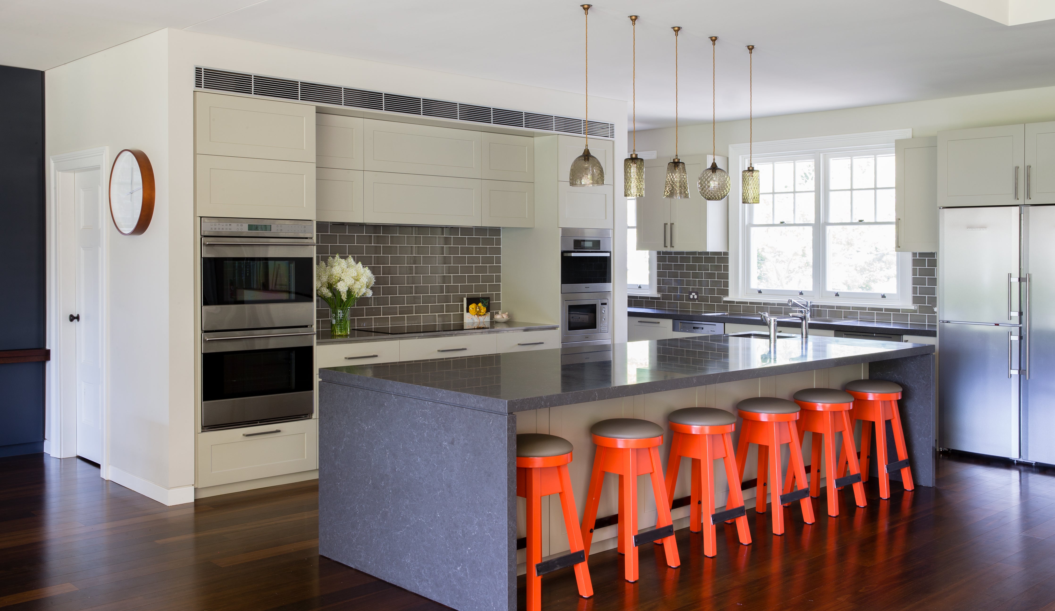 Pick-n-Mix Large pendant lights by Rothschild &amp; Bickers hanging over a kitchen island 