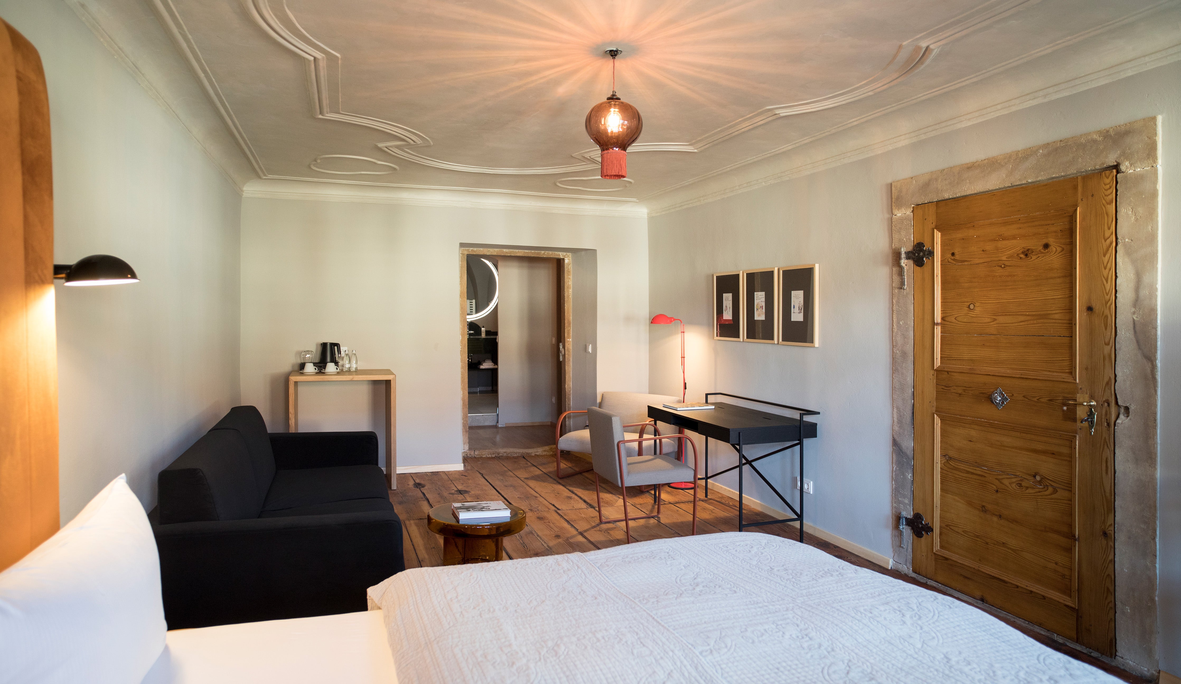 Custom large Opulent optic pendant light by Rothschild &amp; Bickers in Hotel Sonne bedroom