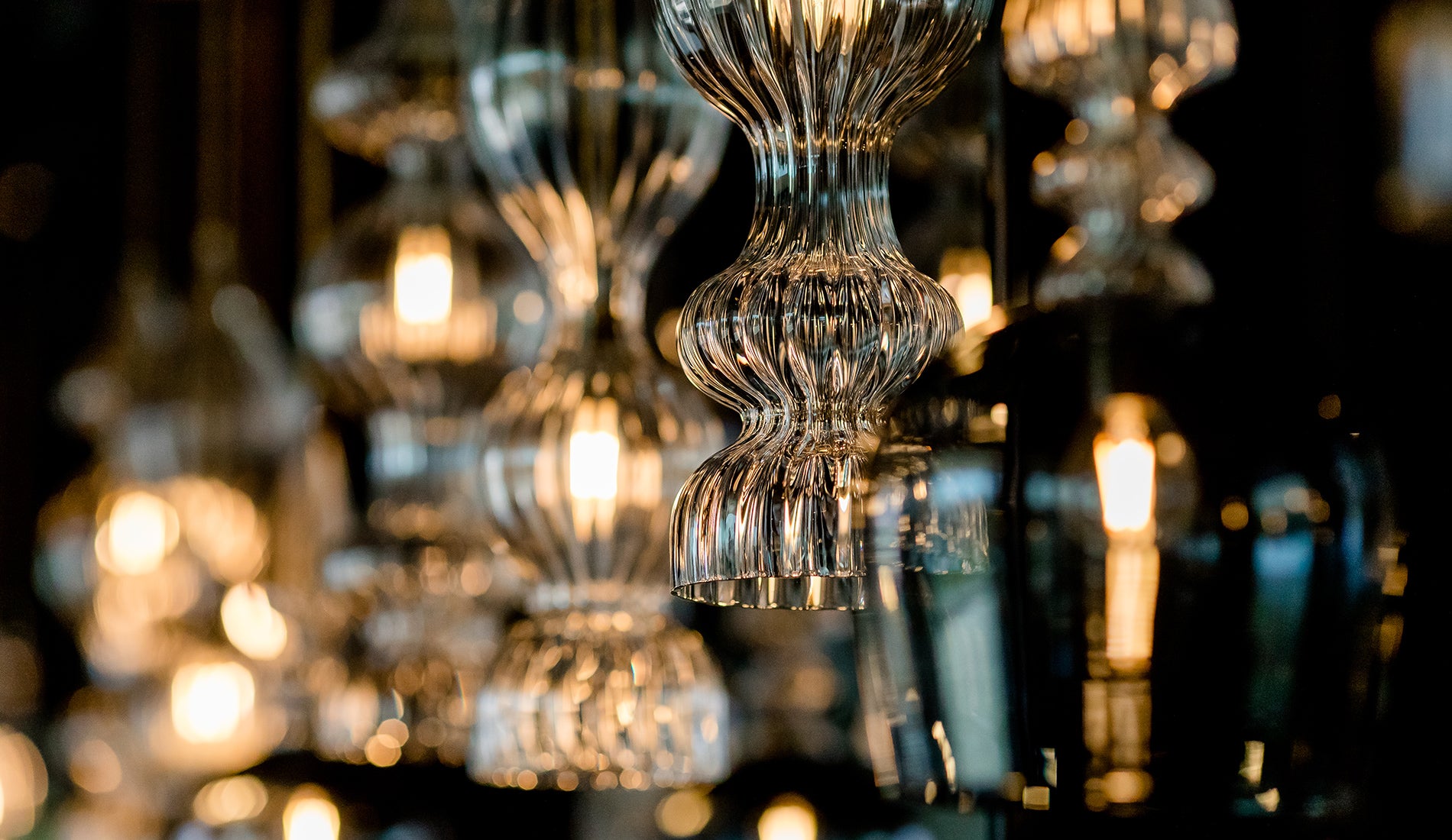 Spindle shades and Spindle Pendants by Rothschild &amp; Bickers hanging over bar, Motel One Salzburg Mirabell