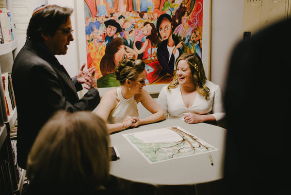 Jenna and Emily's Hip and Intimate Interfaith & Same-Sex Wedding in New York City | Signing the Live Oak Tree Ketubah | Tallulah Ketubahs