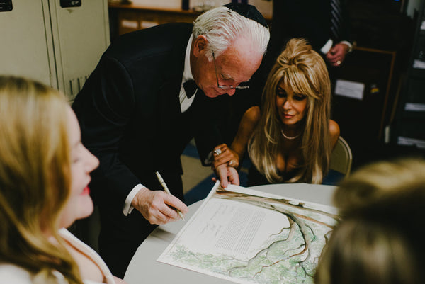 Jenna and Emily's Hip and Intimate Interfaith & Same-Sex Wedding in New York City | Signing the Live Oak Tree Ketubah | Tallulah Ketubahs