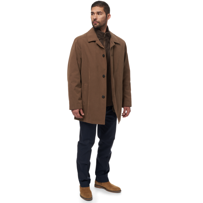 British Khaki || man wearing khaki raincoat with removable bib liner front view