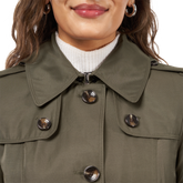  woman wearing a fatigue green colored Missy 49&quot; Long Single-Breasted Rain Coat collar details
