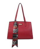  red satchel purse with handles and decorative scarf
