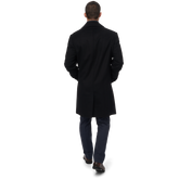  man wearing black wool-blend topcoat back view
