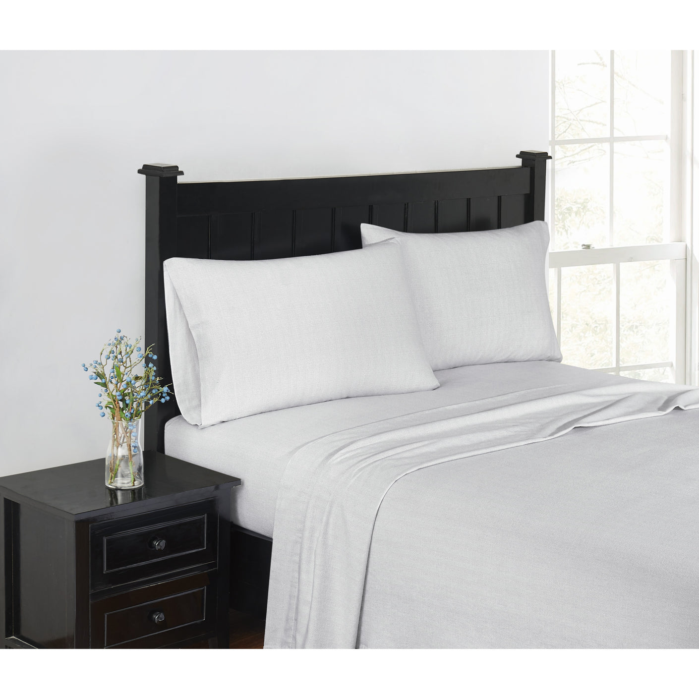 flannel beddings on a black bed