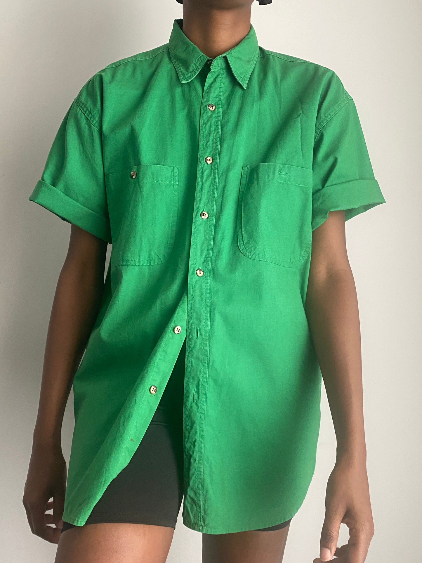 Green short sleeves shirt