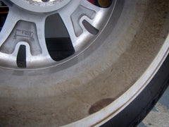 Dirt accumulation on the inside of a 17 inch alloy wheel - close up